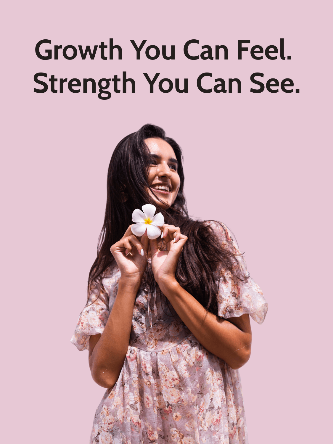 Smiling woman holding flower with long healthy hair, representing results of Kalonji Oil and Vegan Omega 3-6-9 Hair & Scalp Combo for visible hair growth.