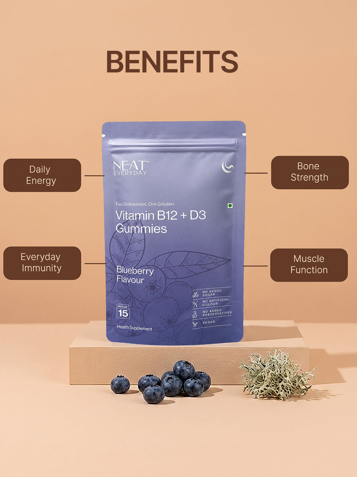 Vitamin B12 + D3 gummies packaging with blueberries on a beige background