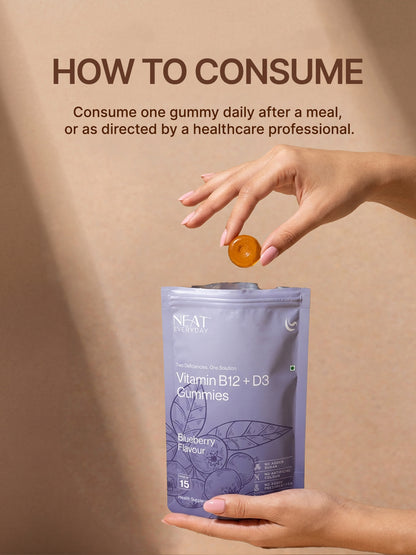 Hand holding a gummy and a package of NEAT Vitamin B12 + D3 Gummies against a beige background.