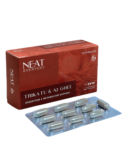 NEAT Everyday Trikatu &amp; A2 Ghee supplement packaging with capsules on a white background